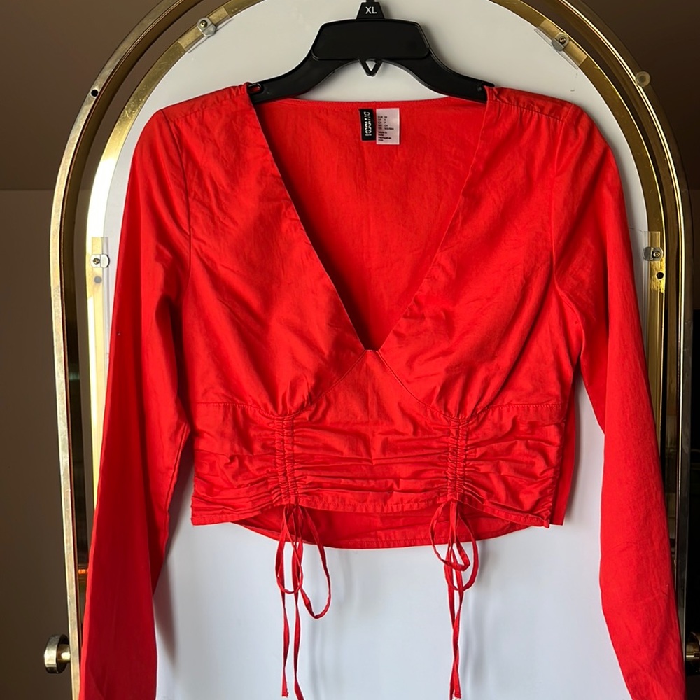 small h&m orange corset like crop top